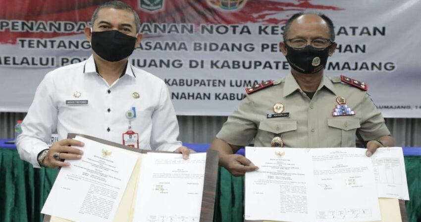 Penandatanganan nota kerjasama bidang pertanahan melalui Pola Tri Juang di Kabupaten Lumajang.